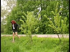 Redhair girl pissing near the road Part 1