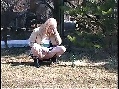 Spying on blonde peeing and smoking teen Part 4