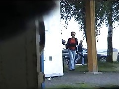 Unsuspecting mature lady in glasses filmed urinating in a private setting Part 1