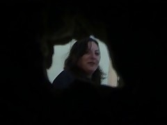 Two attractive gals caught on camera taking a pee in a secluded area Part 3