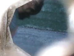 Bold beauty filmed urinating far a public restroom with a sneaky camera Part 1