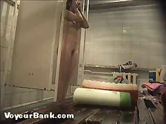 Young slim doll getting spied after in the showers Part 1