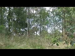 Pissing chick got her pussy barely hidden by grass Part 1